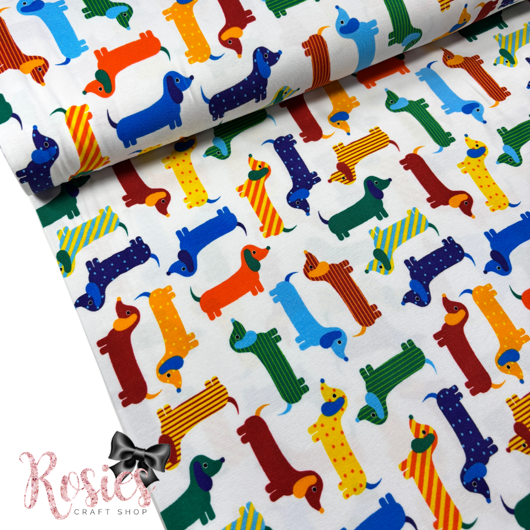 Multi Coloured Sausage Dogs | Urban Zoologie | 150cm Wide | Robert Kaufman Jersey Knit Fabric | £16 pm