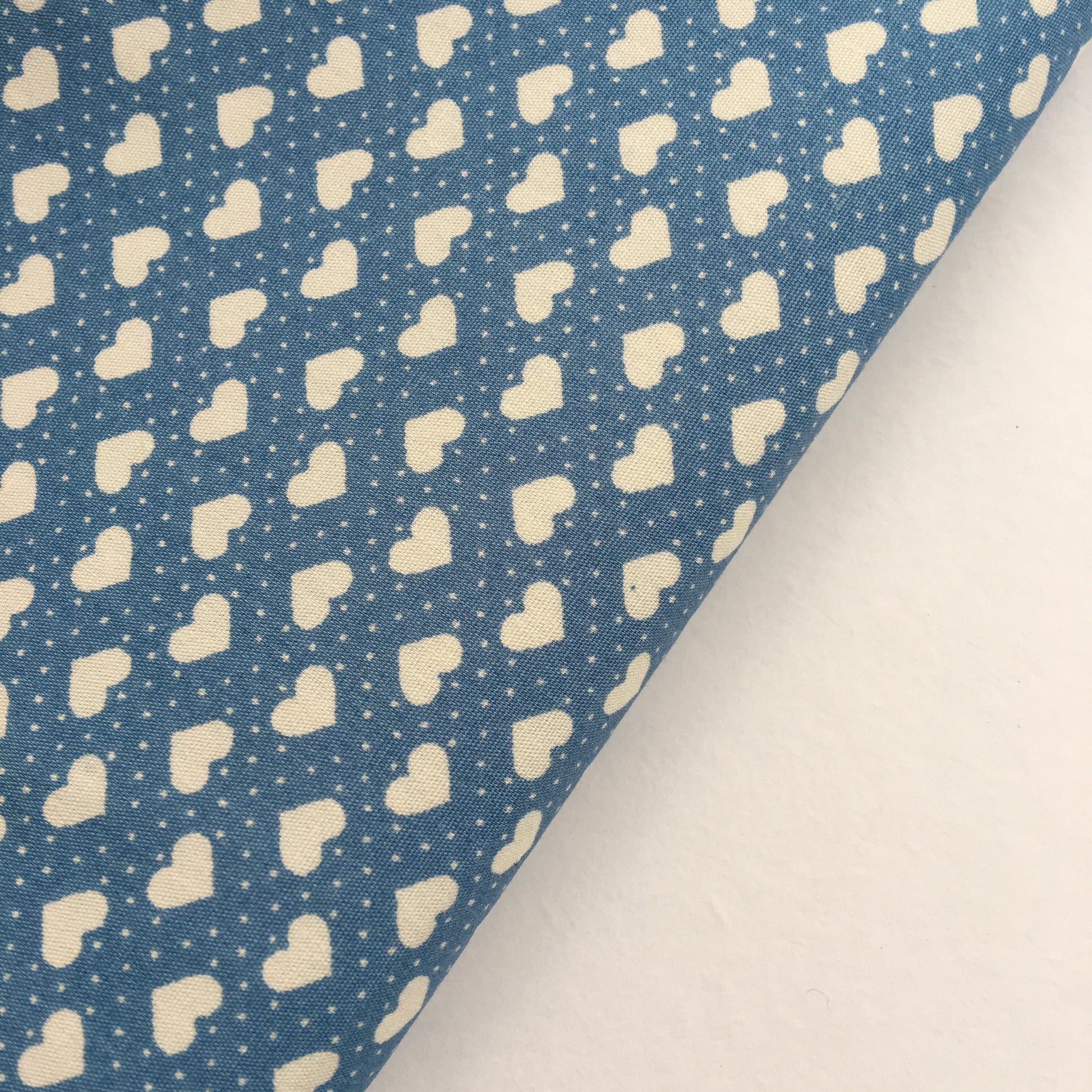 Mini Cream Polka Dot Hearts on Blue 100% Cotton Fabric - Rosie's Craft Shop Ltd